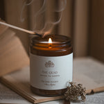 Candle being lit with a match on an open book